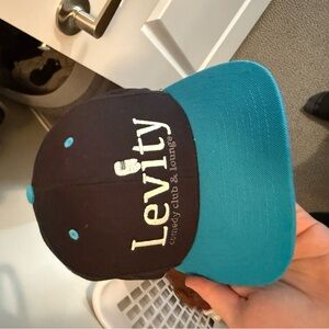 The Classic Black and Teal Cap